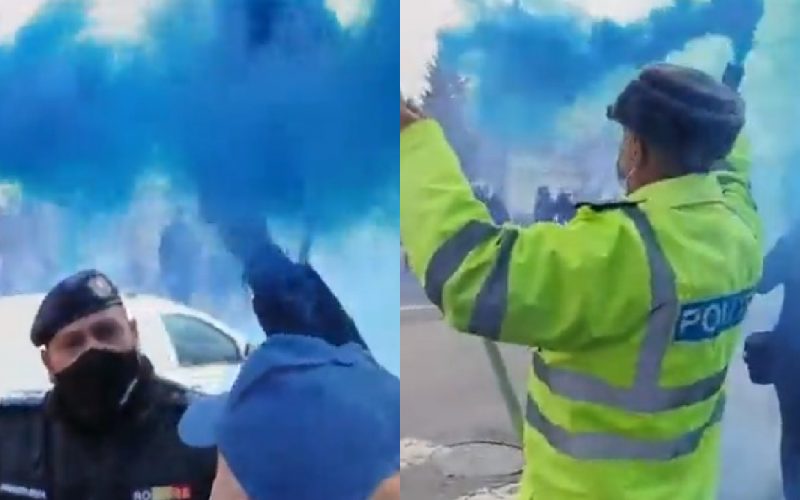 Protest cu fumigene la Ministerul de Interne – Poliţiştii cer demisia ministrului şi au cântat Imnul