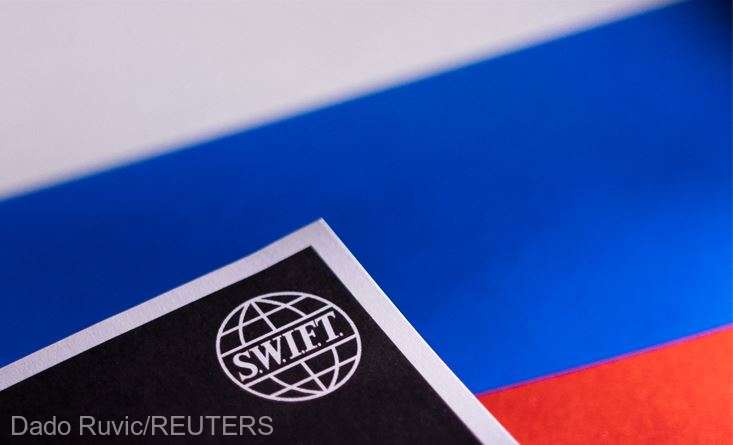 SWIFT anunţă că se pregăteşte să se conformeze restricţiilor impuse băncilor ruseşti