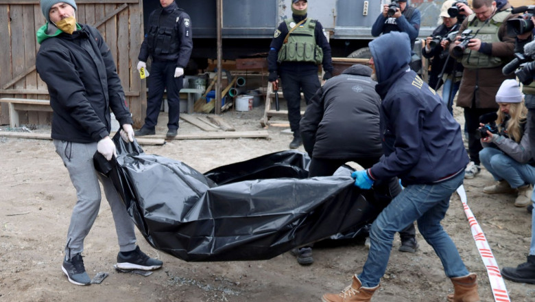 Zeci de civili ucraineni au fost găsiţi într-o groapă comună în Buzova 